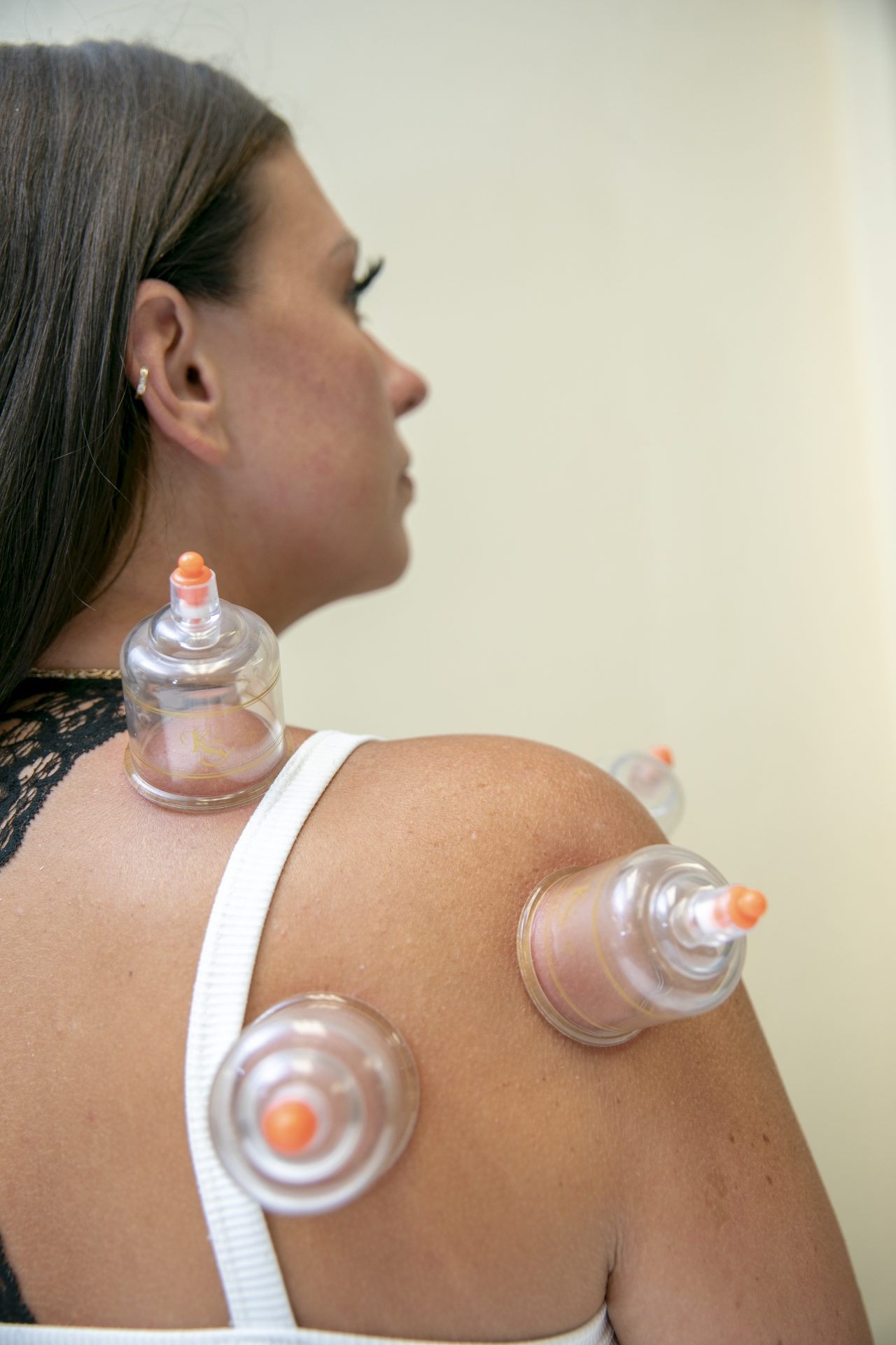 Woman sitting for PT treatment